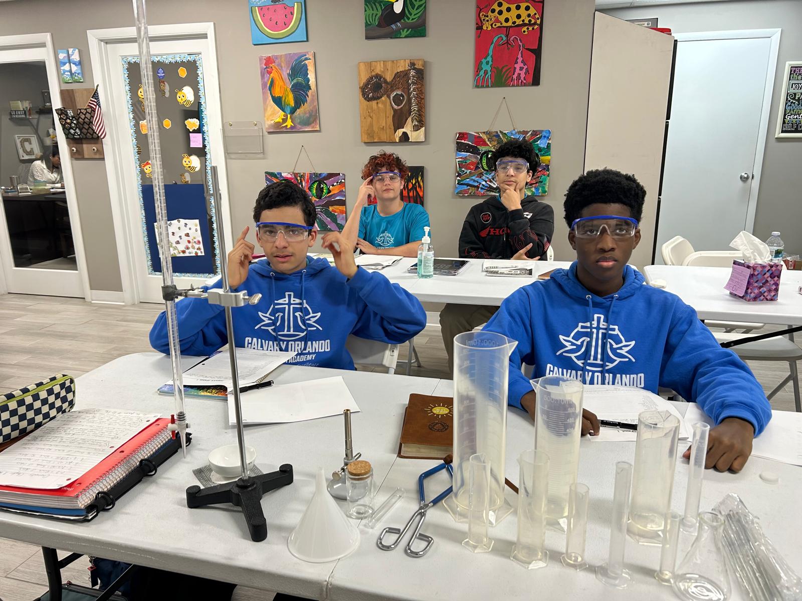 COCA students learning together in the science laboratory